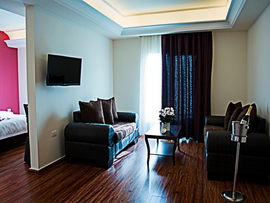 Al Murjan Palace Hotel Джуния Стая снимка